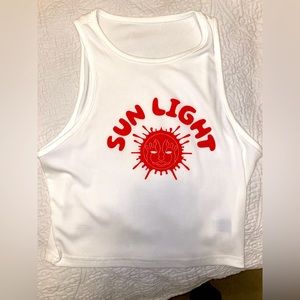 Super cute cropped white small top from pacsun.